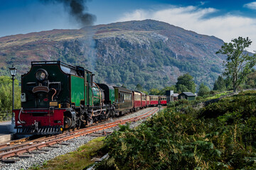 Old Train With Steam Locomotive At Beddgelert Train Station In Snowdonia National Park In Wales,...