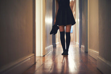 Woman, legs and walking with shoes in hallway for fashion, clothing or outing at home. Closeup of...