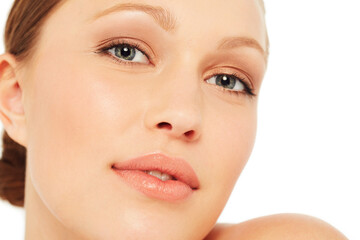 Obraz premium Skincare, cosmetics and portrait of woman on a white background for wellness, beauty and facial. Dermatology, salon and isolated face of person with glamour, healthy skin and aesthetic in studio