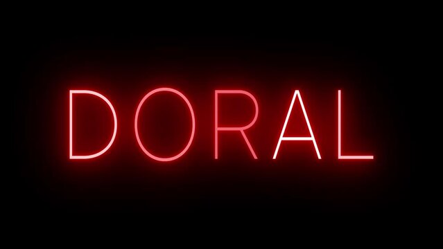 Flickering red retro style neon sign glowing against a black background for DORAL