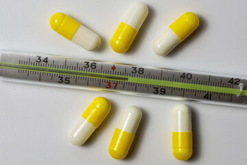 thermometer and pills