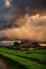 Fototapeta na wymiar cloudy scene in village