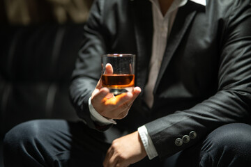 Businessmen in suits drinking  Celebrate whiskey
