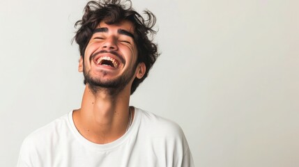 Fototapeta premium Young Brazilian man isolated on white background laughing