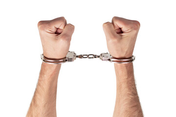 Man's hands in handcuffs on a white background, isolated