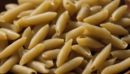 A pile of yellow pasta on a plate