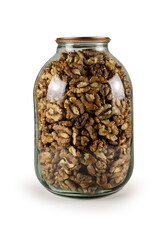 The walnut kernels in jar isolated on white background.