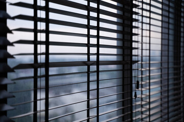Roller blinds on modern windows Blinds on office windows Modern style roller blinds control the lighting range