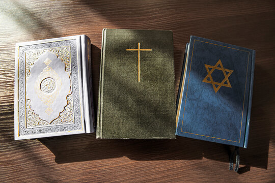 Quran, Bible, Talmud or Torah, religion concept