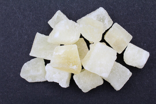 Indian sweet petha or Agra petha on black background close-up view 