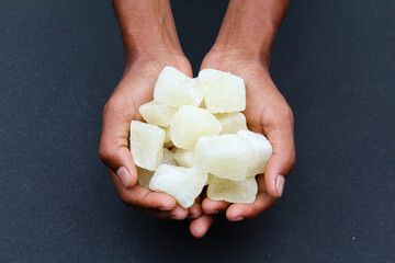 Holding some sweet Agra petha in hand 