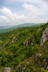 Jelasnicka Klisura and the view from the Prozorac lookout point on the huge rocks and meadows that spread across the mountain (Jelasnica Klisura, Suva planina).