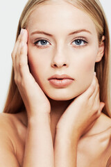 Woman, face and hands on skin for beauty, natural cosmetics and glamour on white background. Clean,...