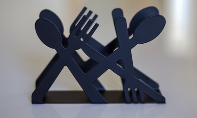 Fototapeta premium fork and spoon on blue