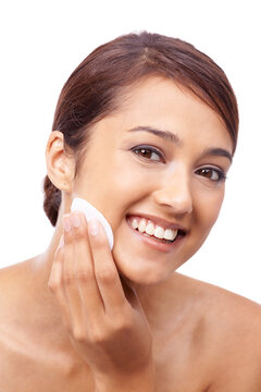 Woman, cotton pad and beauty with portrait, face and model for makeup removal on white background. Happy, beautiful and headshot with shine, skincare or clean for glow, dermatology or toner