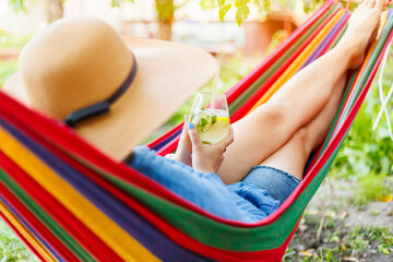 Relaxing Summer Day in a Vibrant Hammock with a Drink