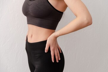 Young girl in sportswear on white background. Yoga clothes. 