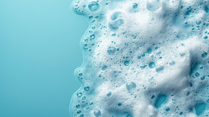 spot of thick shampoo foam on a blue background - obrazy, fototapety, plakaty