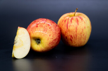 Apple with a slices isolated on black background with clipping path,