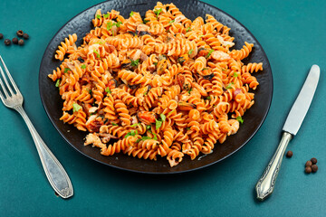 Cooked mussels and pasta, macaroni.