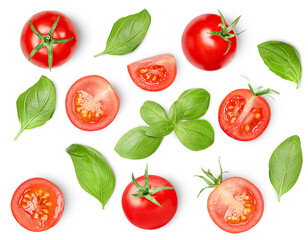 Cherry tomatoes and basil leaves on a white isolated background, top view