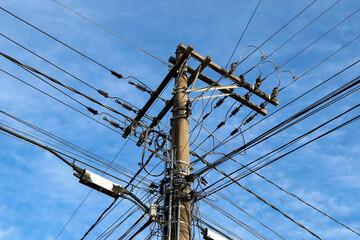 pole and cables for electricity, telephony and fiber optics