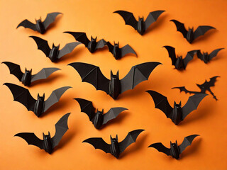 orange background with a flock of black paper bats for Halloween, Halloween concept