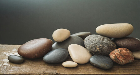 Fototapeta na wymiar stones on a grey background