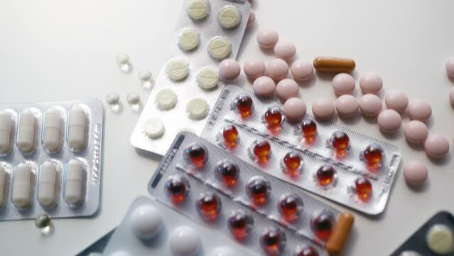 Close-up of medical pills in packages, patent medicine, healthcare reforms