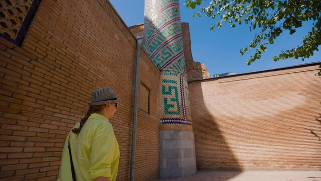 Tourist in Gur Emir Mausoleum in Samarkand
