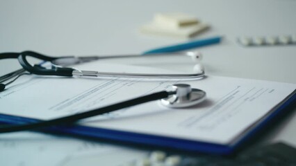 Close-up of doctor's prescription and pills on a table, U.S. healthcare system