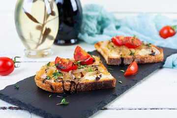 Hot sandwich with caramelized onion and cheese. Roasted bread toast