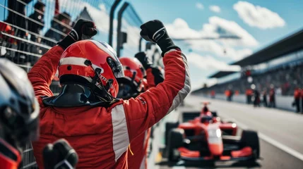  Team of mechanics happy at their drivers victory. © PaulShlykov