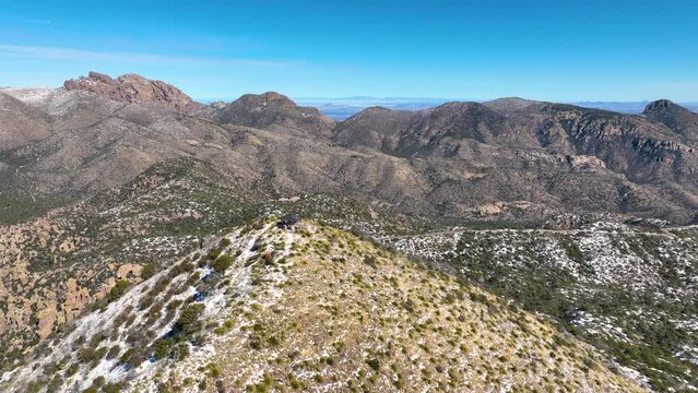 Sugarloaf Mountain aerial view with snow on the top in winter in Chiricahua National Monument in Cochise County in Arizona AZ, USA. 