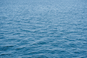 Blank view with white reflections of ocean waves as background
