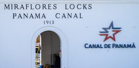 Main house of panama canal locks with gateway and big letters - MIRAFLORES LOCKS PANAMA CANAL 1913
