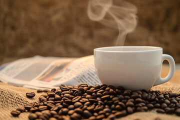 Hot Coffee with Beans and Newspaper