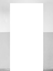 An empty cutout for a door in a white wall, the lower half of which is painted gray. Free space for a door on the wall.
