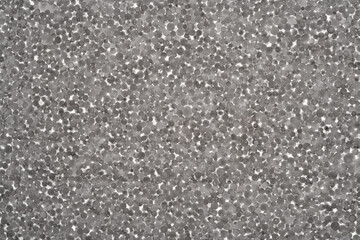 Styrofoam board, close-up of granules, backlit.