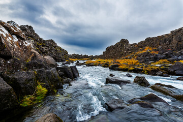 Naklejka na ściany i meble River in the mountains, The mystical landscape of Iceland