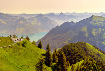 Spectacular panoramic aerial views of central Switzerland, the Alps, mountains, villages and Lake...