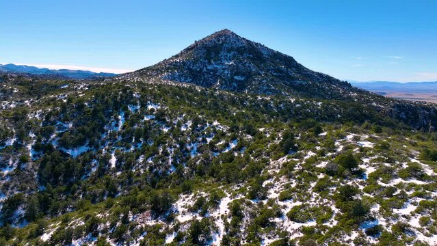 Sugarloaf Mountain aerial view with snow on the top in winter in Chiricahua National Monument in Cochise County in Arizona AZ, USA. 