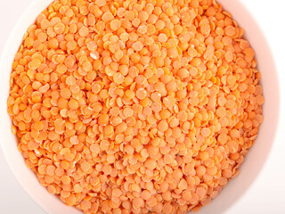 red lentil over white background