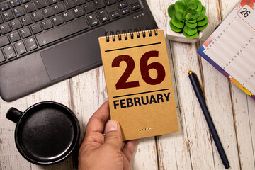 February 26. Hand writing text For Pete's Sake Day on calendar date. Save the date. Holiday. Day of...