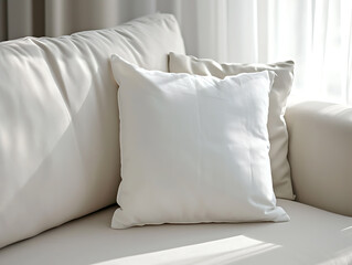 Mockup of 2 cushions in white, and cream on a sofa, in a modern, minimalist-themed room in cream. Exposed to sunlight coming from outside the window. Created with Generative AI.