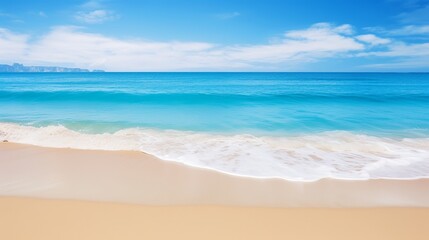 Fototapeta premium A beach that is sandy and has a blue ocean.