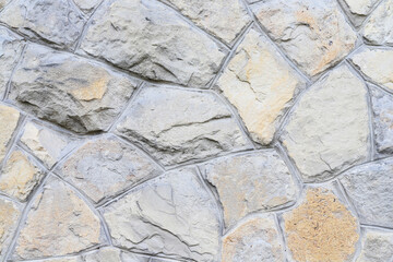 Wall of the old castle made of sandstone.