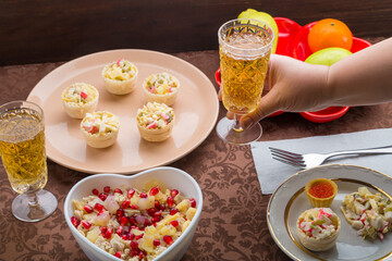 Sparkling champagne in two glasses on a festively set table