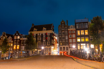 Fototapeta na wymiar Night Amsterdam and Parked Bicycles