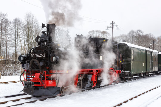 Pressnitztalbahn steam train locomotive railway in winter in Steinbach, Germany